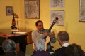 Gerry Saulter performs on guitar at the Fourth Friday Studio Series